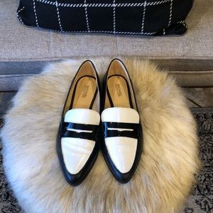 Never worn Michael Kors leather slip ons.
